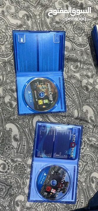 Ps4 with two controllers and 4 games including overwatxh ultimate edition
