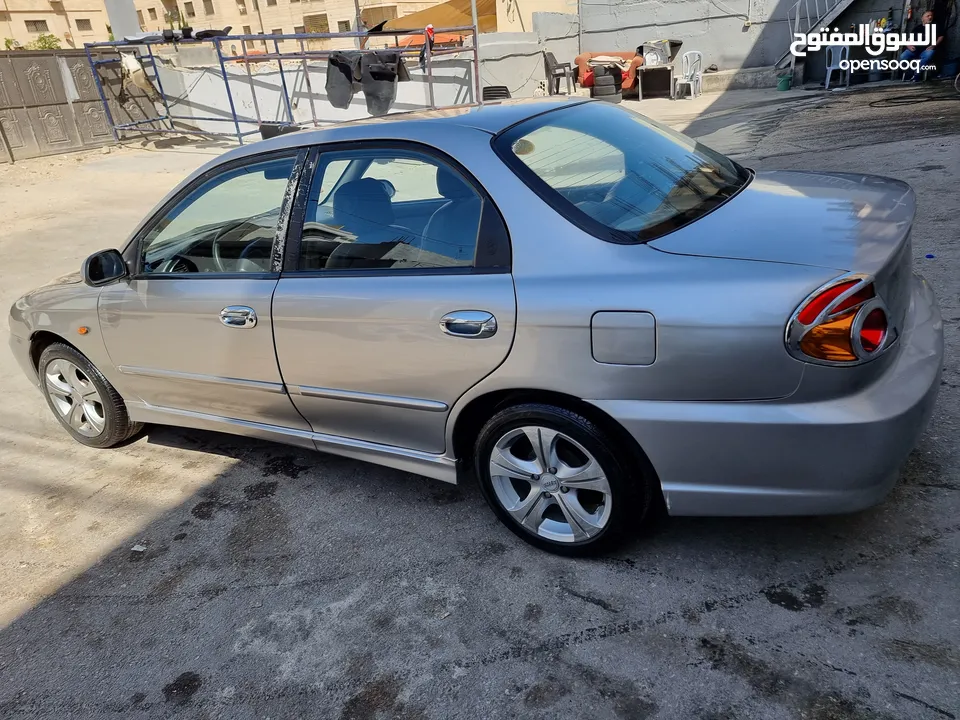 كيا سبيكترا 2001 بسعر 2400 جير عادي سياره نظيفه جدا  kia spectra 2001