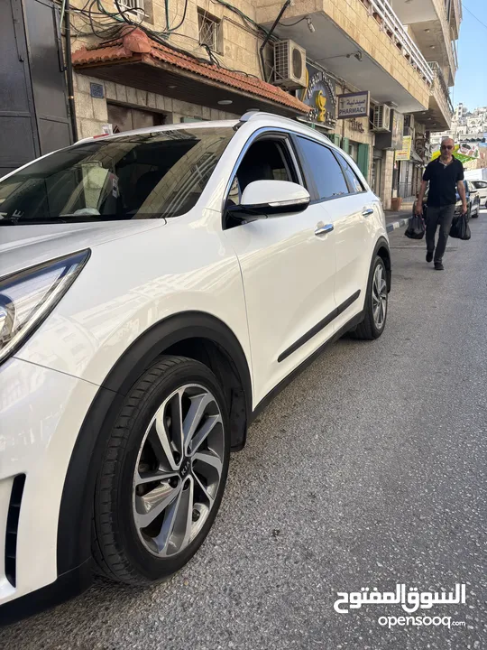 كيا نيرو 2019 -الاتصال على رقم الوطنيه في الوصف