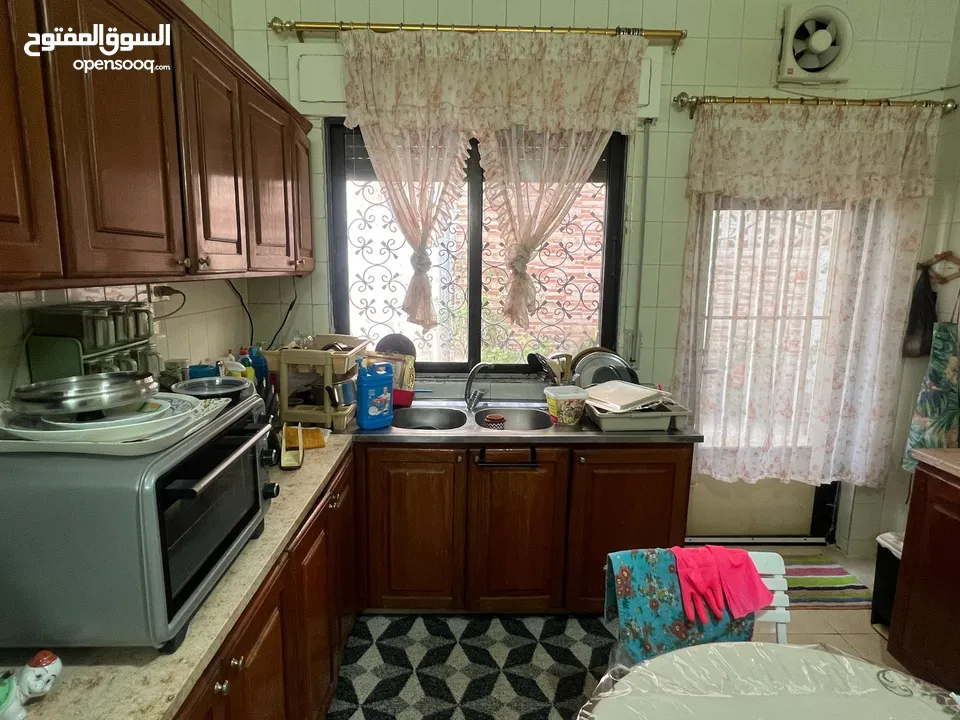 A standalone two-story house in the Rashid Suburb  with a built-up area of 150 square meters