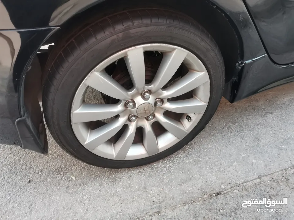جنط لانسر ex gt 18 مع كوشوك تويو جديد