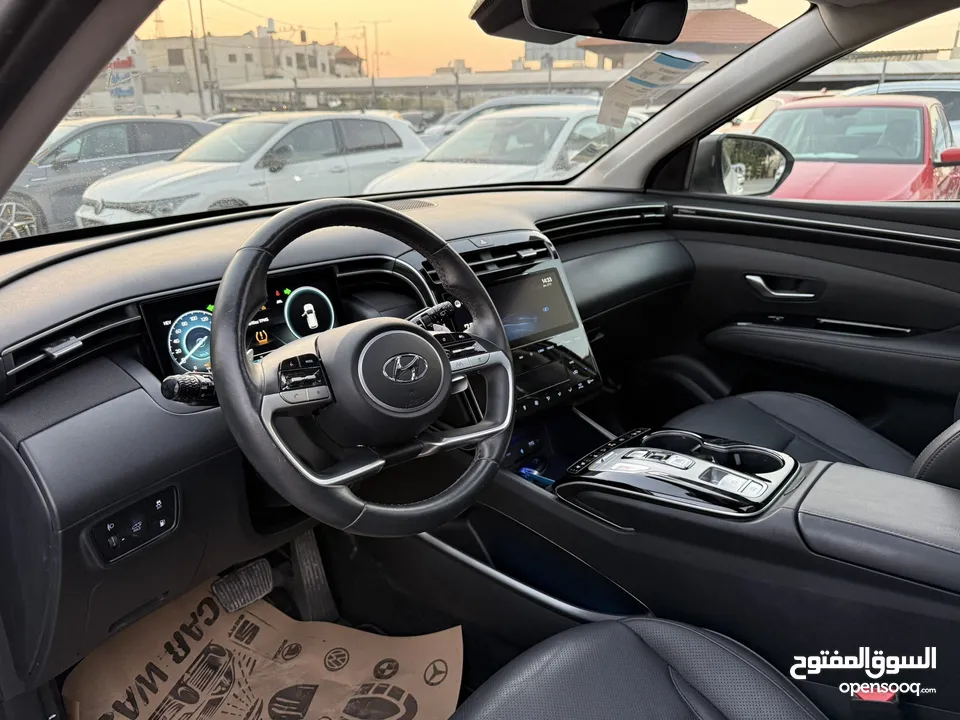هونداي توسان ترخيص 2022 محرك 1600 هايبرد plug in/يقطع على الشحنه 65 كيلو متر 271 حصان