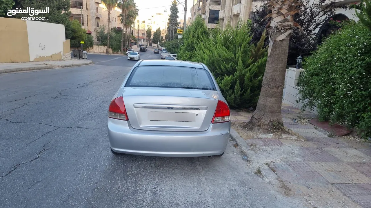كيا سيراتو لون سلفر موقع جاردنز