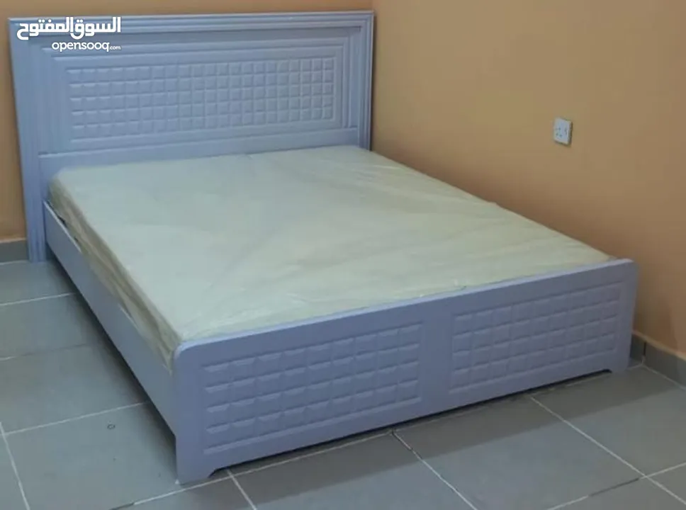 WOODEN BED 180X200