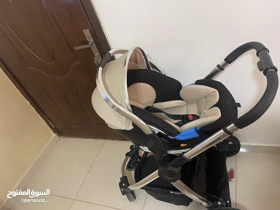 عرباية اطفال Mother care بحالة جيدة جدا