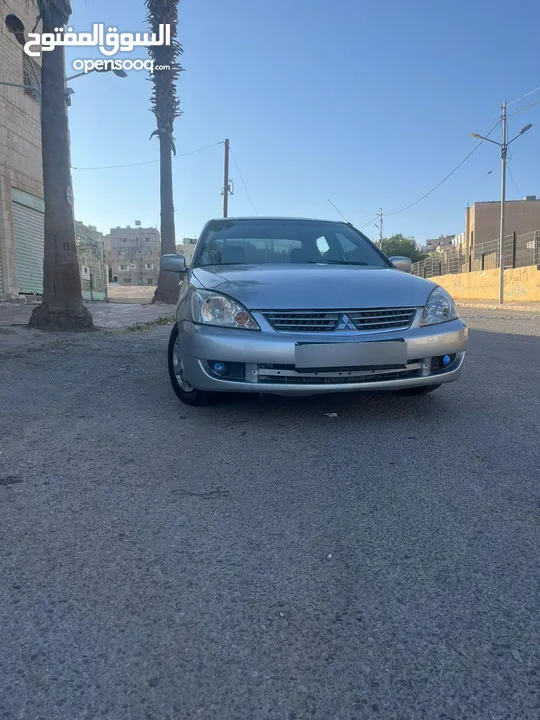 متسوبيشي لانسر 2004محدثه بالكامل 2013