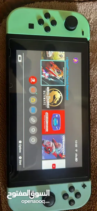 NINTENDO SWITCH 512 GB WITH 9 GAMES