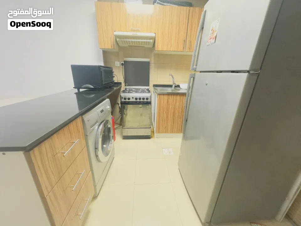 شقة غرفة وصالة للبيع في السيتي تاور – موقع مميز على شارع الشيخ خليفة – فرصة استثمارية