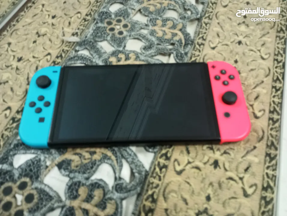 نينتندو سويتش Oled بحالة ممتازة Nintendo switch Oled