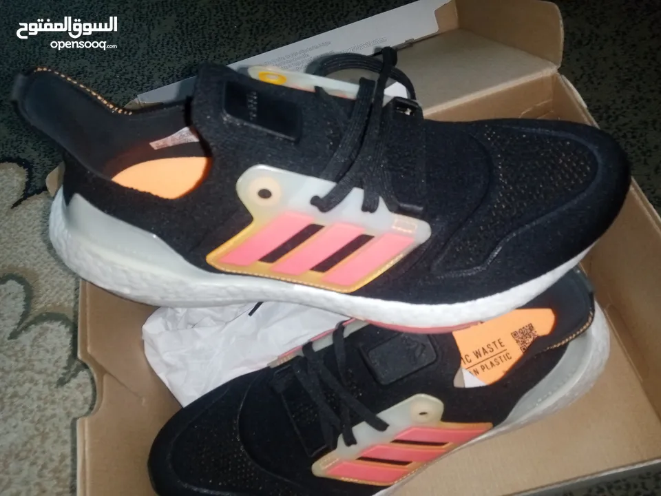 حذاء adidas UltraBoost 22 Black Flash Orange اصلي بنص سعره بسعر مغري جدا الفضل للمشي والراحة