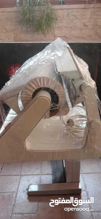 مكوى برادي يعمل عاي الكهرباء