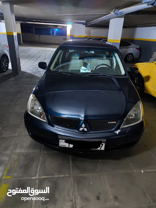 متسوبيشي لانسر GLX 2007 1600 cc وارد الخليج الكويت جميع الإضافات بإستثناء الفتحه وجنط إضافي.