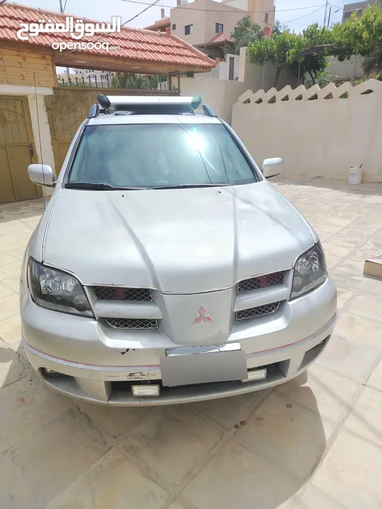 ميتسوبيشي اوت لاندر 2003