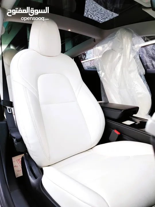 تيسلا 2023 model 3 فحص كامل اوتوسكور لون اسود ملوكي داخلي ابيض بحالة الوكالة للبيع بسعر لقطة ومحرووق