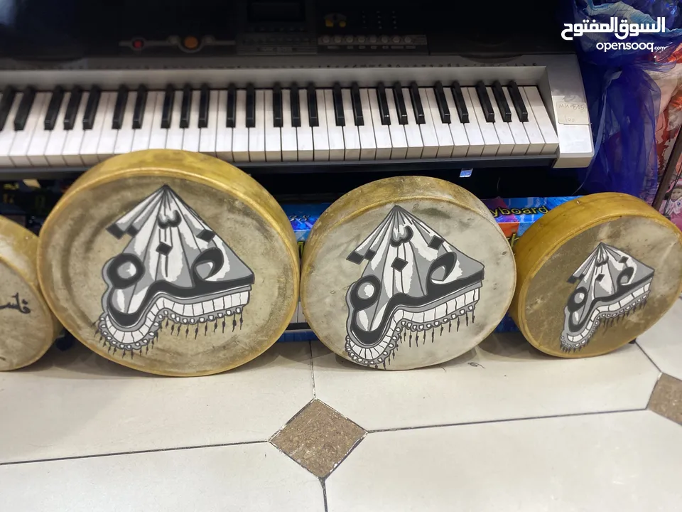 طقم دف جلد ثلاث احجام مشغول رسم ع الوجه