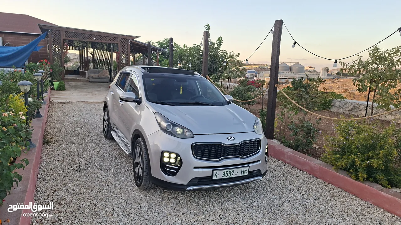 كيا سبورتج جتي لاين 2016ماتور2000ديزل فلل اضافات مع فتحة سقف بنوراما  بسعر حررررق كاش دهان شركة