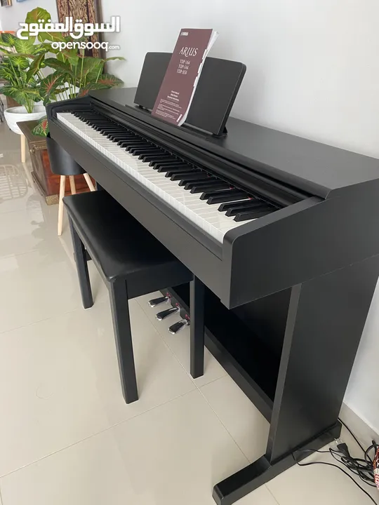 Yamaha digital piano Arius YDP-144B complete with bench.
