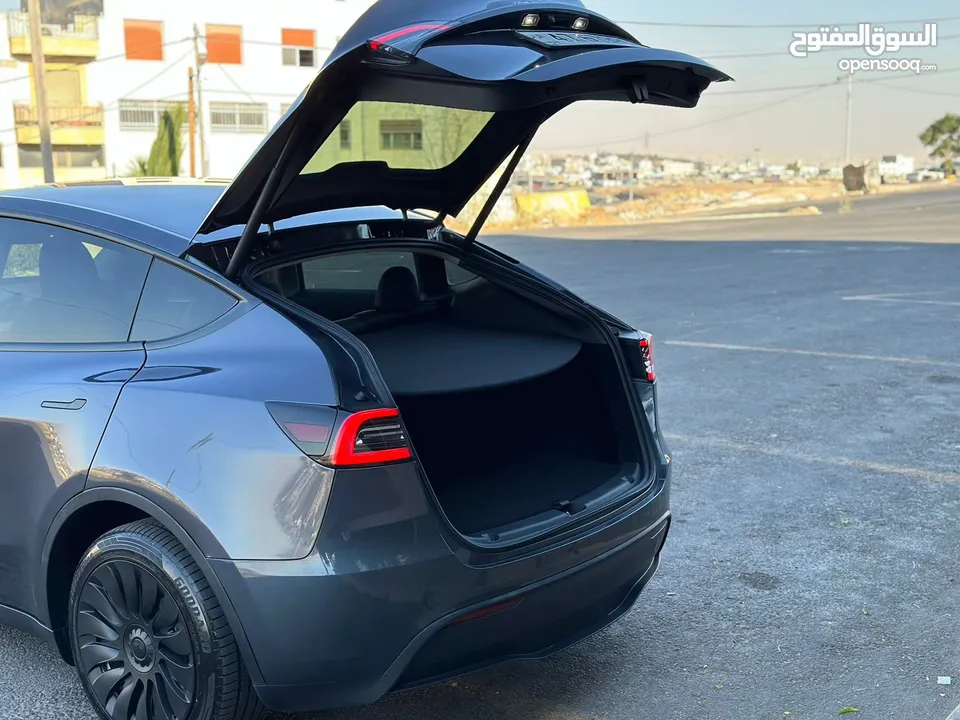 Tesla model y 2023 long range dual motor  تيسلا موديل y لونق رينج 2023 بحاله الوكاله