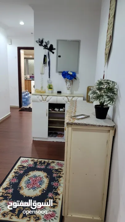 For rent in Ajman, a furnished apartment  two rooms and a hall