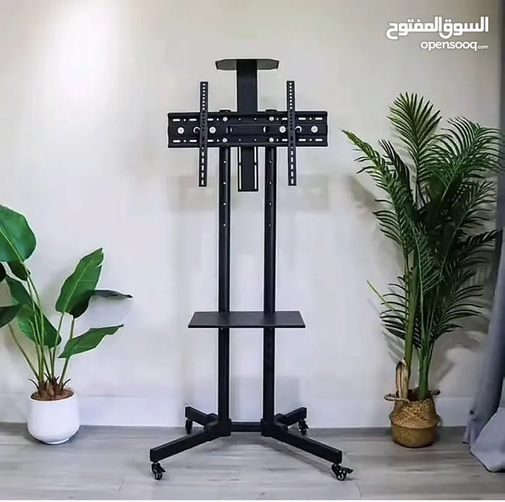 ستاند تلفزيون متحرّك بجودة عالية وتصميم عصري لو عندك شاشة كبيرة وبدك حامل قوي وثابت او بدك تنقل شاشة