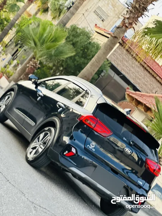 كيا نيرو هايبرد 2020 تورنج فل الفل كاش او اقساط غرفه مميزه لون خمري فتحه