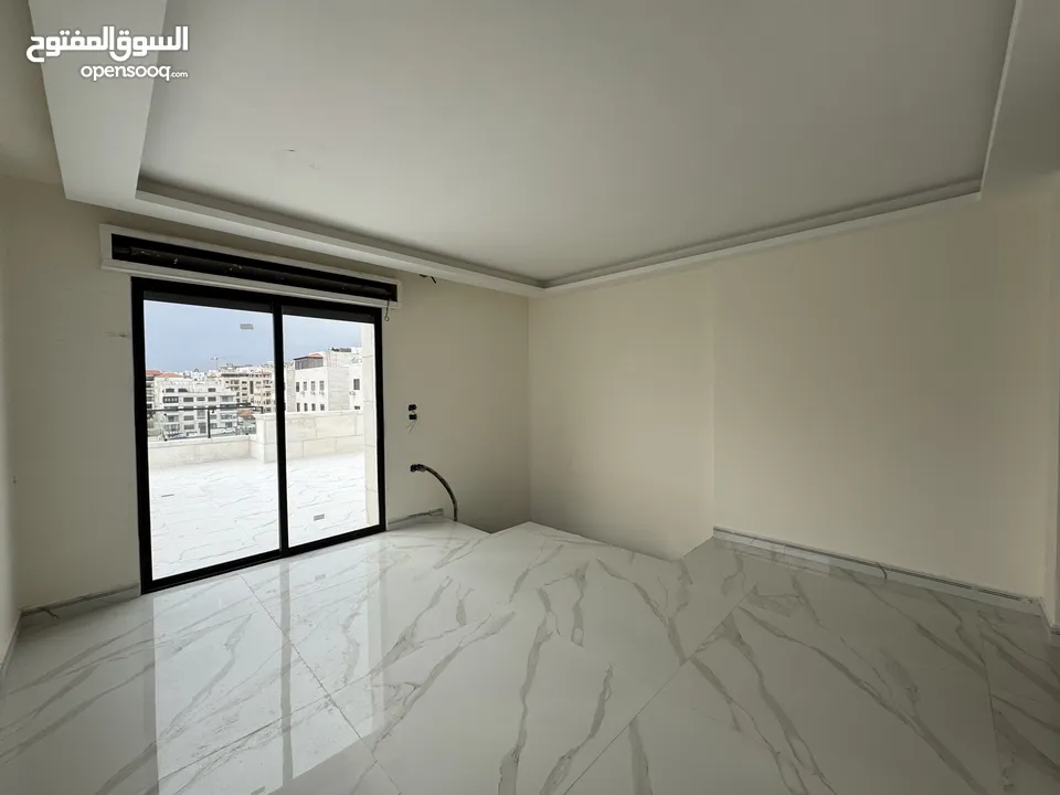 روف مع شقة دوبليكس للبيع في خلدا مساحة الشقة 200م والروف 120م وترس 50م (مشروع 110)