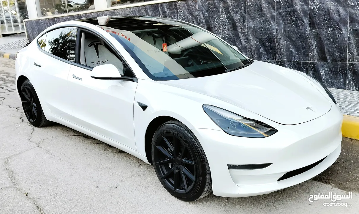 تيسلا 2022 model 3 فحص كامل اوتوسكور +B بدون ملاحظات بودي (كرت ابيض) بحالة الوكالة بسعر لقطة ومحرووق