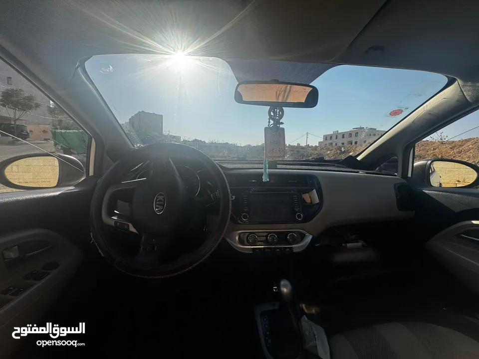 كيا برايد 2014  لون ابيض السيارة ماشا لله مش ناقصها شيء  ماطور 1400  4 غيار السيارة البيع فقط كاش.