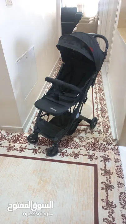 عرباية أطفال شبه جديدة للبيع
