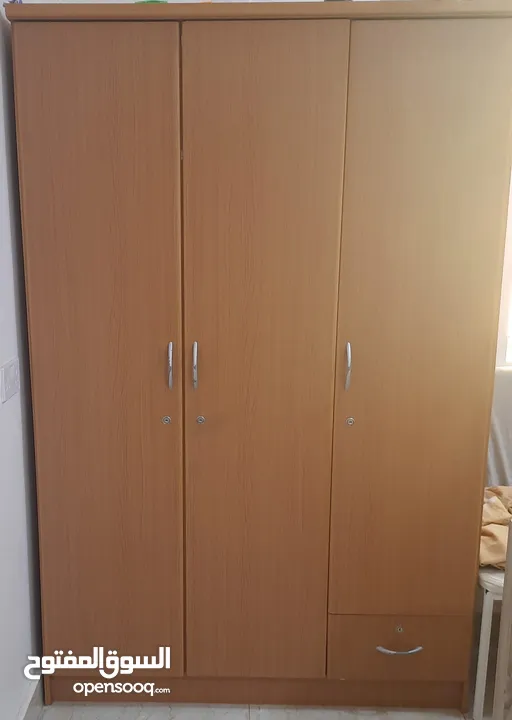 3 door wooden cupboard