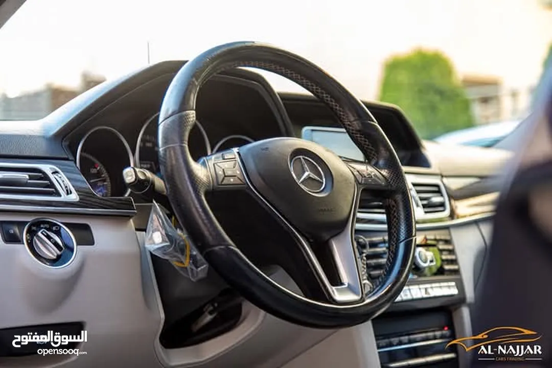 Mercedes E200 Avantgarde Amg kit 2015  السيارة وارد و بحالة الوكالة