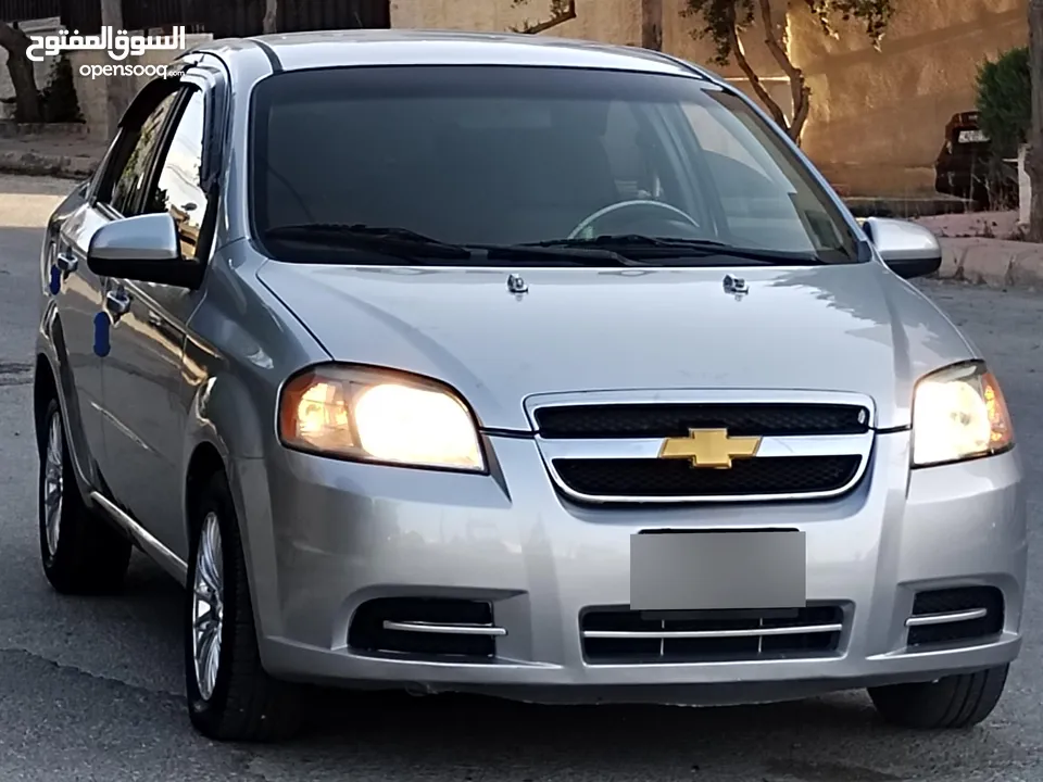 شفروليه افيو اوتوماتيك 2011 توب نظافة بسعرررر مميززز محرك 1600cc دهان جديد ترخيص سنه