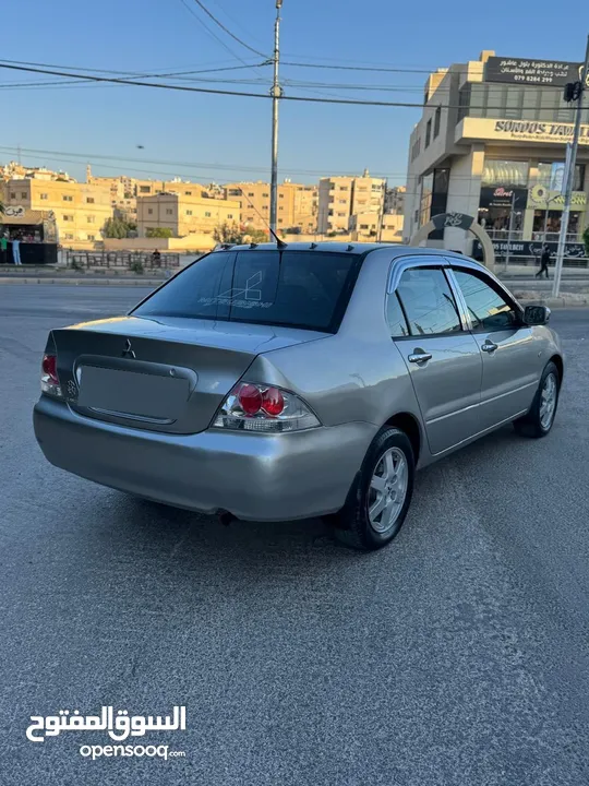 ميتسوبيشي لانسر فحص كامل 1600اصلي ولا ملاحظه موديل 2009 اوتوماتيك بوضع الشركه وارد الكويت مالك واحد
