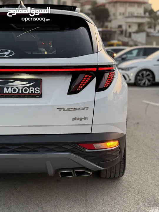 هونداي توسان ترخيص 2022 محرك 1600 هايبرد plug in/يقطع على الشحنه 65 كيلو متر 271 حصان