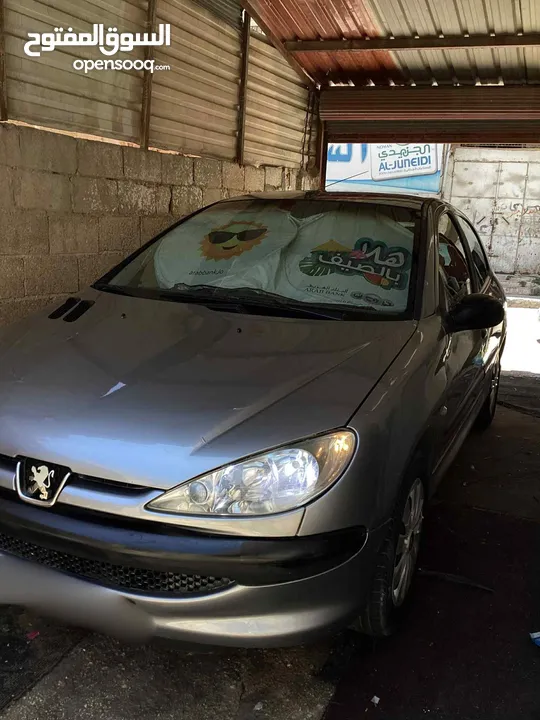بيجو 206 للبيع بسعر مغري فحص 3 جيد الفحص مرفق بالصور.