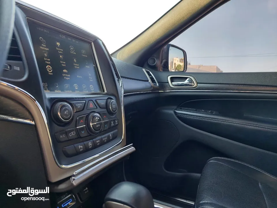 جيب جراند شيروكي فل الفل اعلى فئة بانوراما 2014 فحص كامل لون فيراني مميز بسعر مغري قابل للبدل والاقص