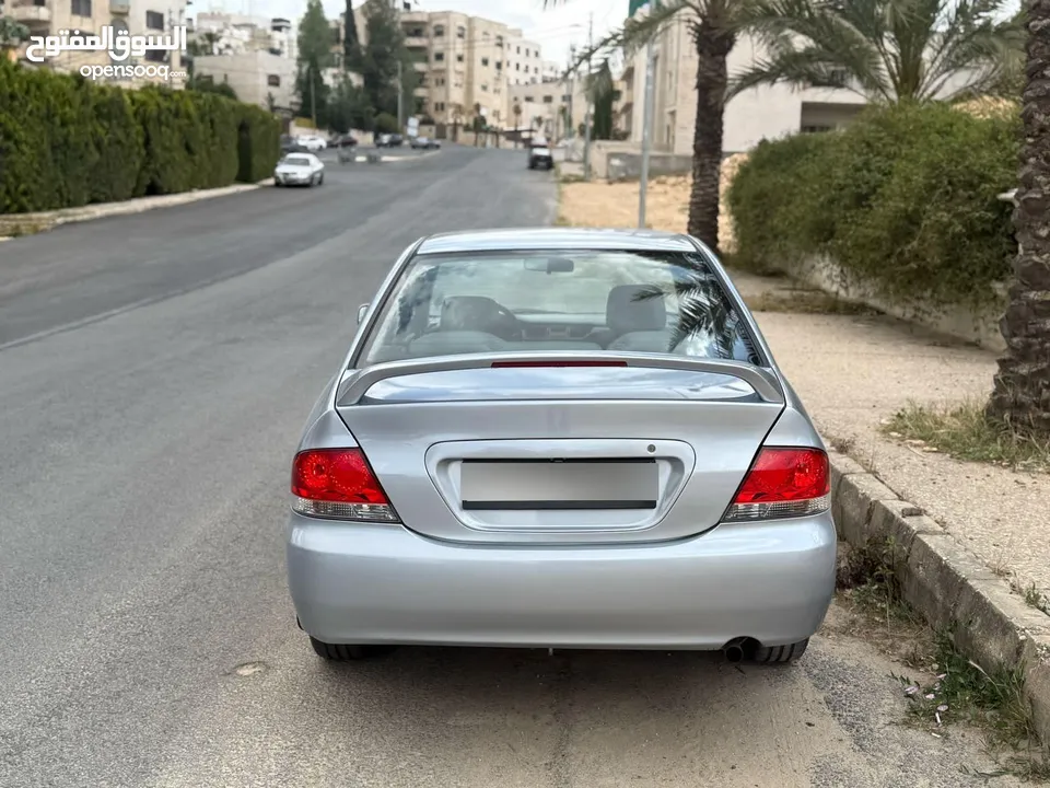 ميتسوبيشي لانسر موديل 2007 وارد الوكالة الاردنيه فحص لون سلفر مميز جدا قاطعة مسافة 100 الف كيلو مستخ