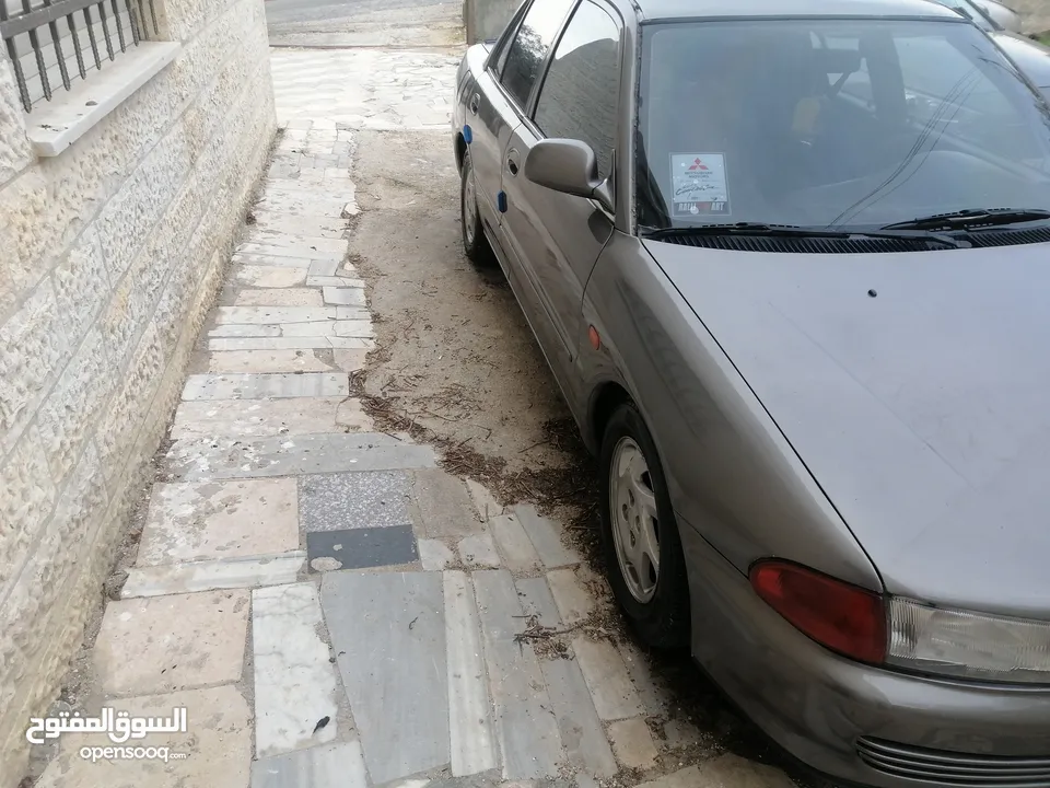 بسطار نمرة 39 + سياره ميتسوبيشي لانسر 1992 للبيع