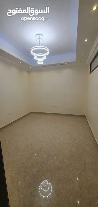 Unfurnished two-room VIP apartment in Al Rawda 3 in Ajman, 2 bathrooms, with a balcony