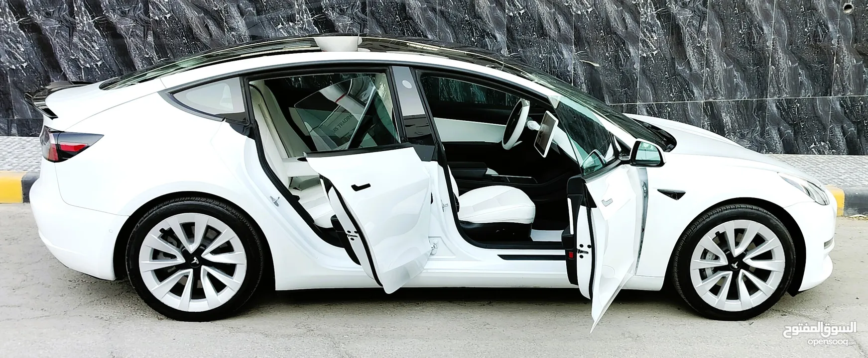 تيسلا 2021 model 3 فحص كامل 4 جـيـد فرش ابيض جنط 19بحالة الوكالة لون مميز للبيع بسعر لقطة ومحروووق