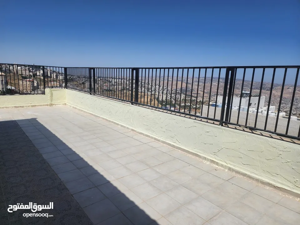 شقة مع رووف و ترس إطلالة أبدية خلابة  على جبال جرش و السلط في أجمل مناطق الجبيهة ابو عوف تنظيم أ