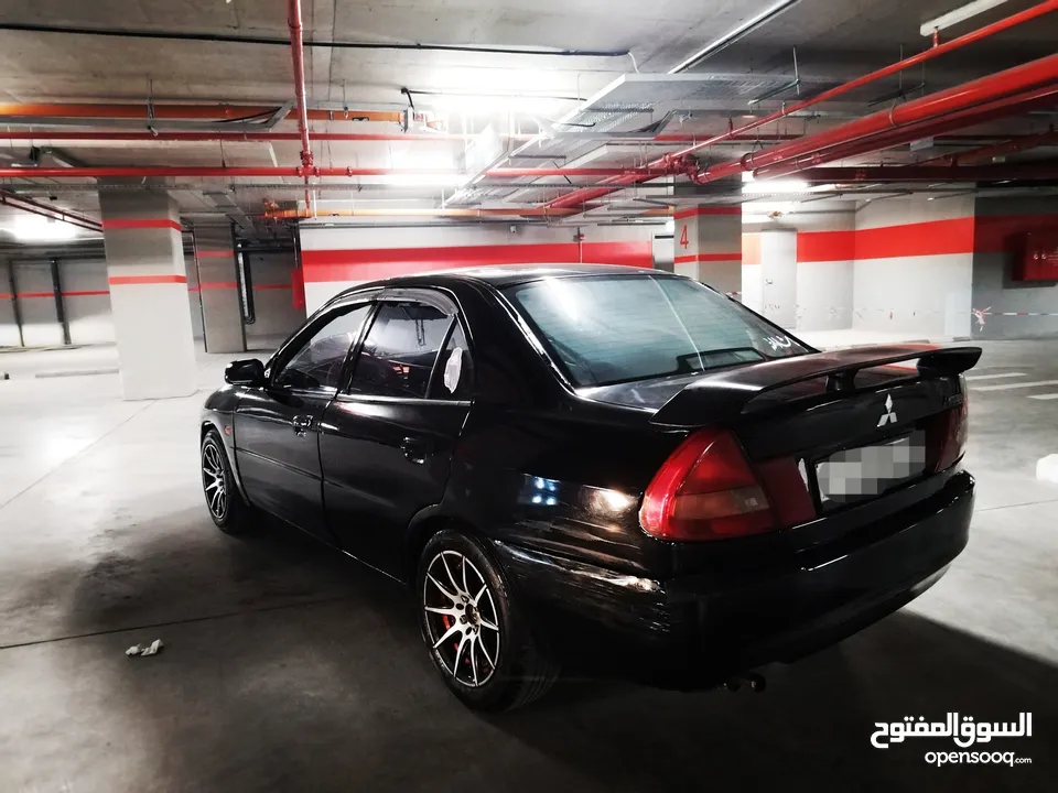 ميتسوبيشي لانسر 1997 اتوماتيك بداعي السفر المستعجل