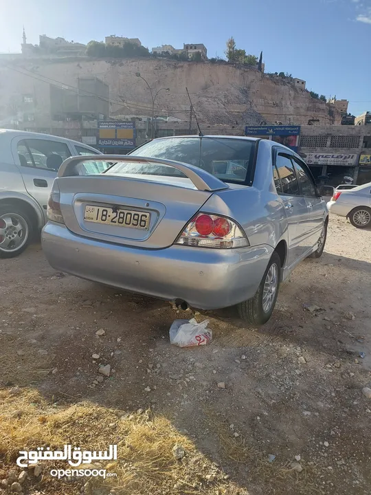 لانسر 2005 وارد الكويت 4 جيد ماتور 1600 الاصلي "الملا"