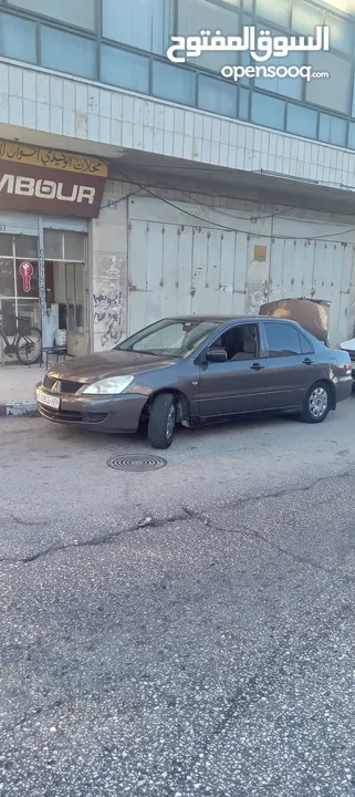 متسوبيشي لانسر جير عادي