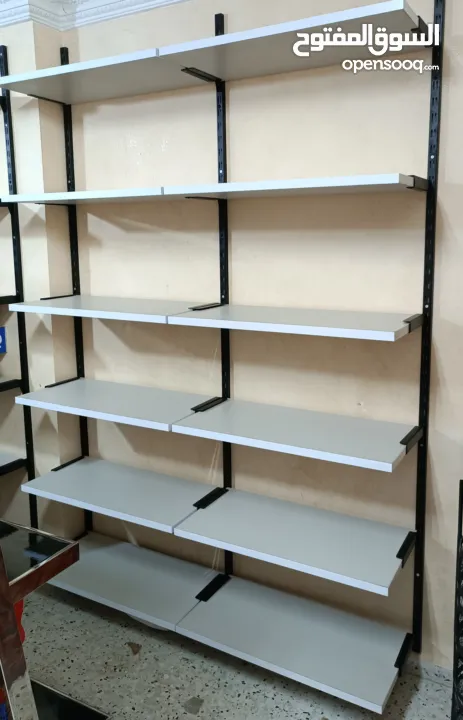 أجهزة كاشير / رفوف خشب/ رفوف زجاج/سلات عرض/ سلات زبائن