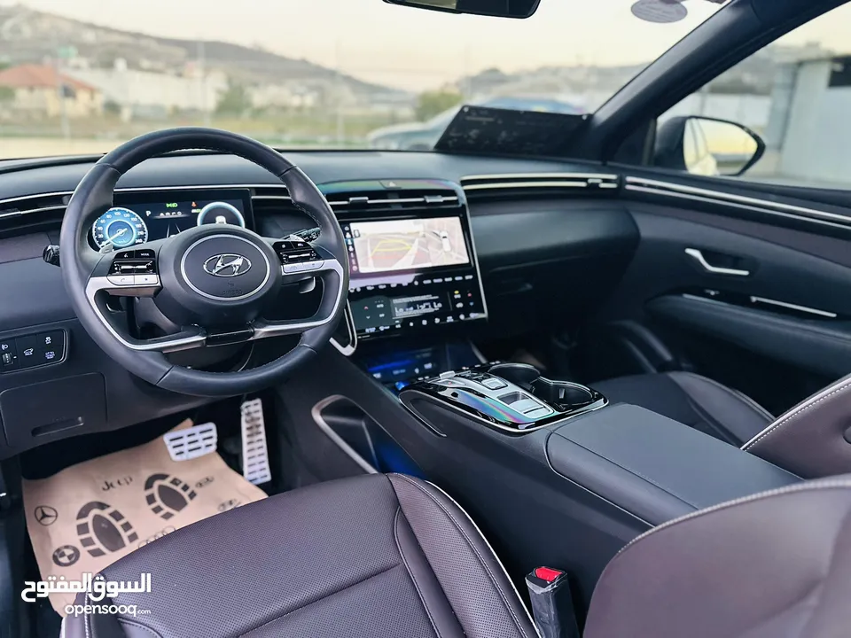 هونداي توسان/2024  فل الفل فتحة سقف بانوراما  2x4 ///240Hp بنزين + كهرباء  ( Haybrid) 1600cc
