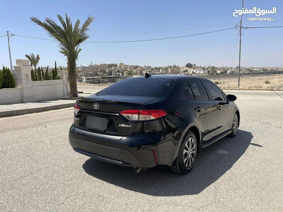 تويوتا كورولا 2020 هايبرد لون اسود حره باسم المستورد
