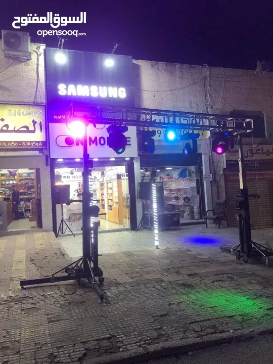 اجهزة اضاءة متحركة للمحلات والمناسبات تراس اضاءة موفينج هيد بيمات باركانات سماعات دي جي اقواس بلالين