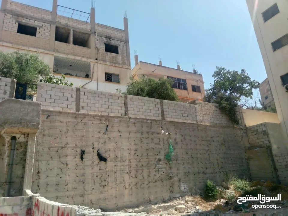 ارض سكني مجرفة مع جدار استنادي مساحة 250 متر.  التواصل على الواتس