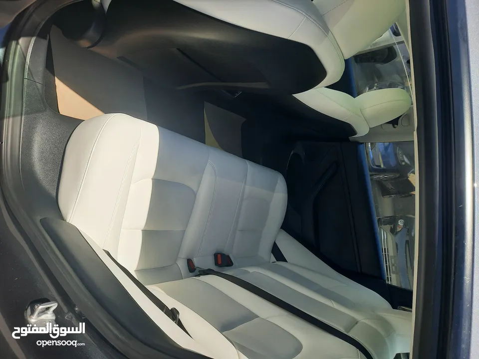 تيسلا موديل 3 موديل 2023 لون فيراني داخل ابيض عداد قليل بسعر مناسب